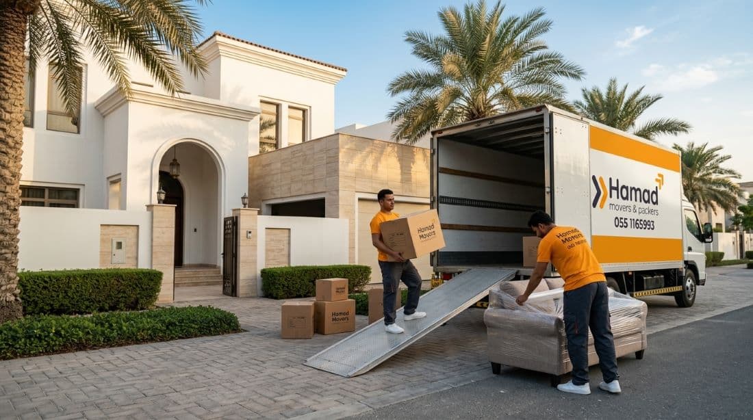 Professional movers and packers in Abu Dhabi – Hamad Movers team loading a truck outside a modern UAE villa
