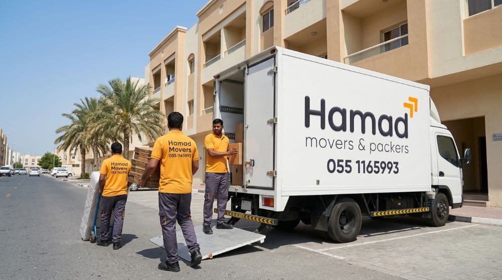 Professional movers and packers in Abu Dhabi – Hamad Movers team loading a truck outside a modern UAE villa