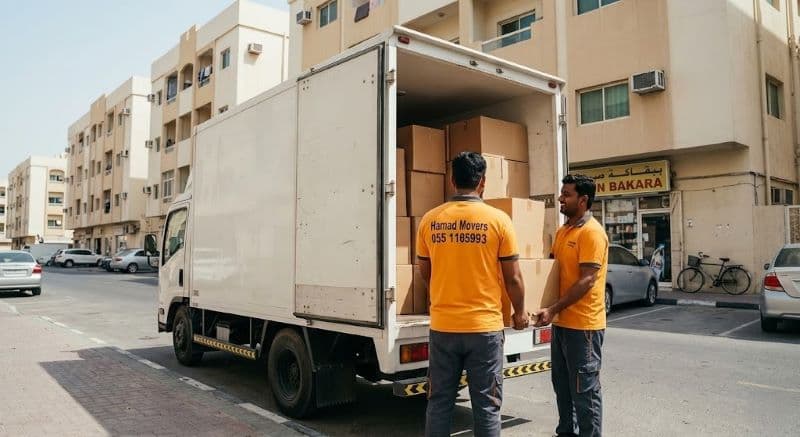 Affordable movers in Dubai loading boxes into truck — budget-friendly moving service by Hamad Movers
