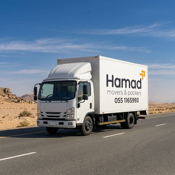 Hamad Movers truck on Al Ain to Dubai highway – inter-emirate moving service UAE