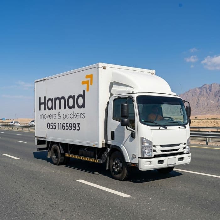 Hamad Movers truck on Ras Al Khaimah to Dubai route – long distance inter-emirate moving UAE
